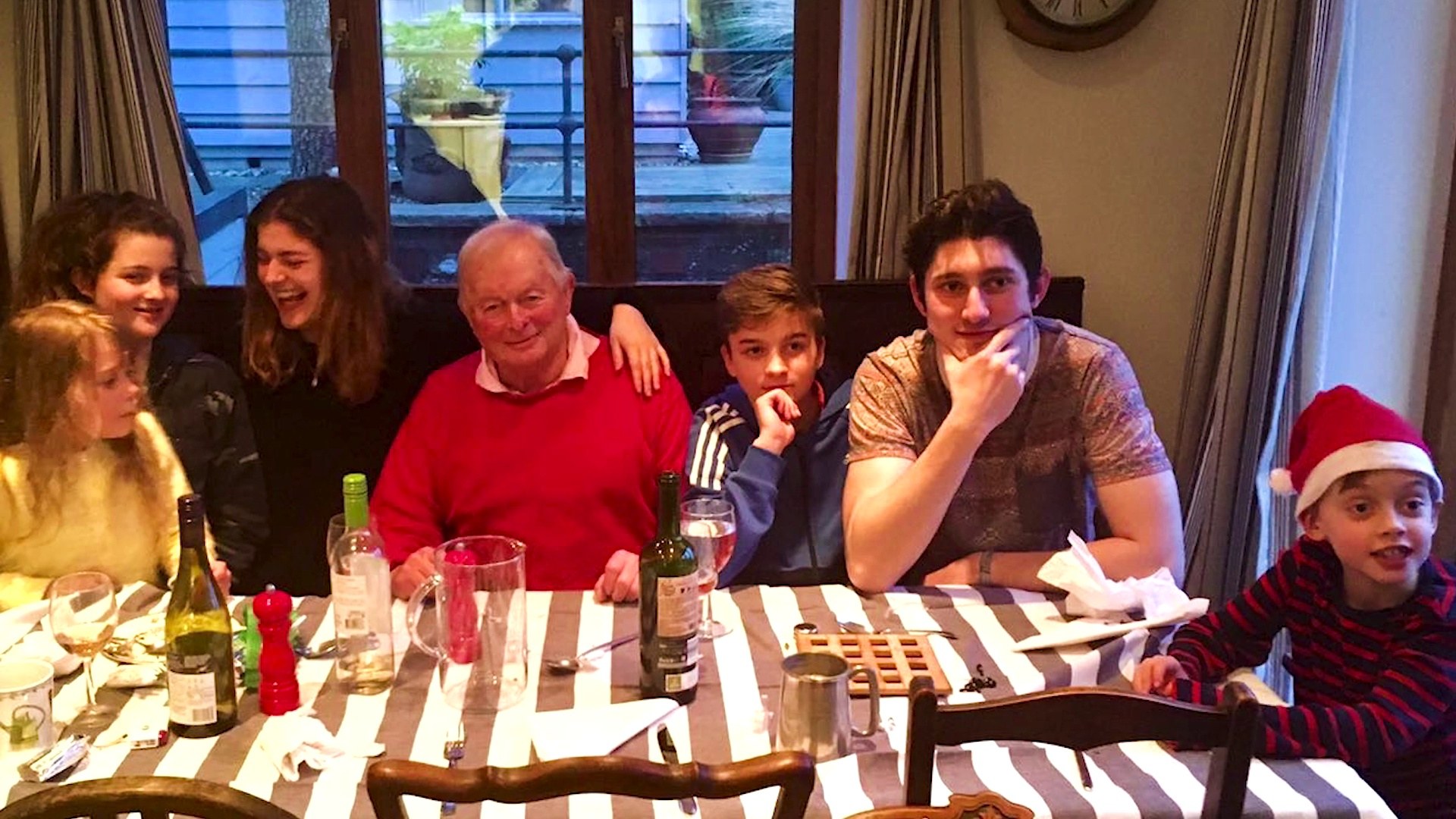 Tony at the Christmas table with his grandchildren